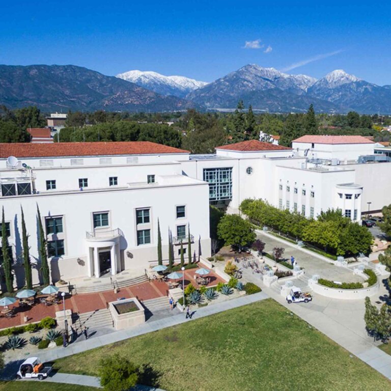 areial view of the two large white buildings with the san bernardino mountains in the background