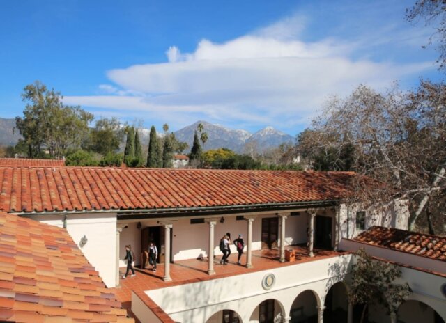 an areial view of scripps' Balch hall wiht students walking down the outdoor walkway
