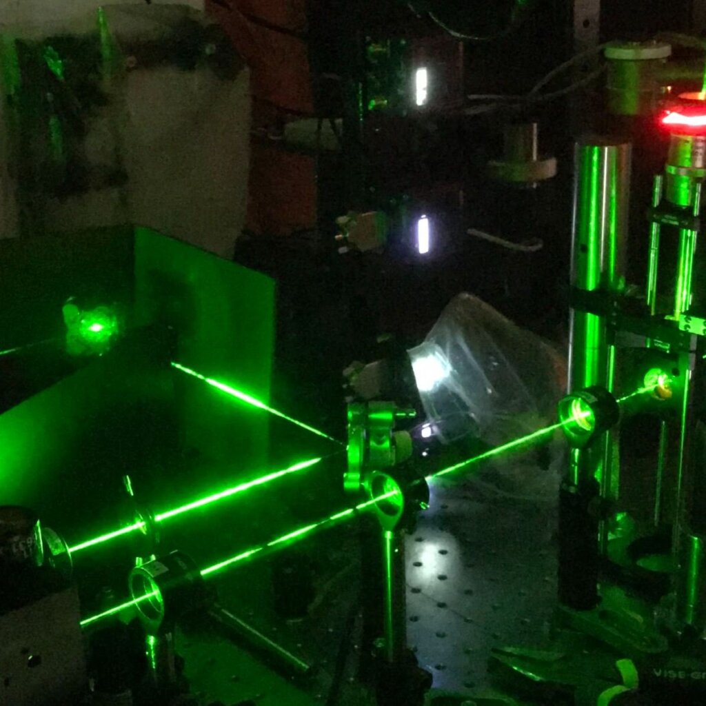 a physics instrument shoots out green lasers