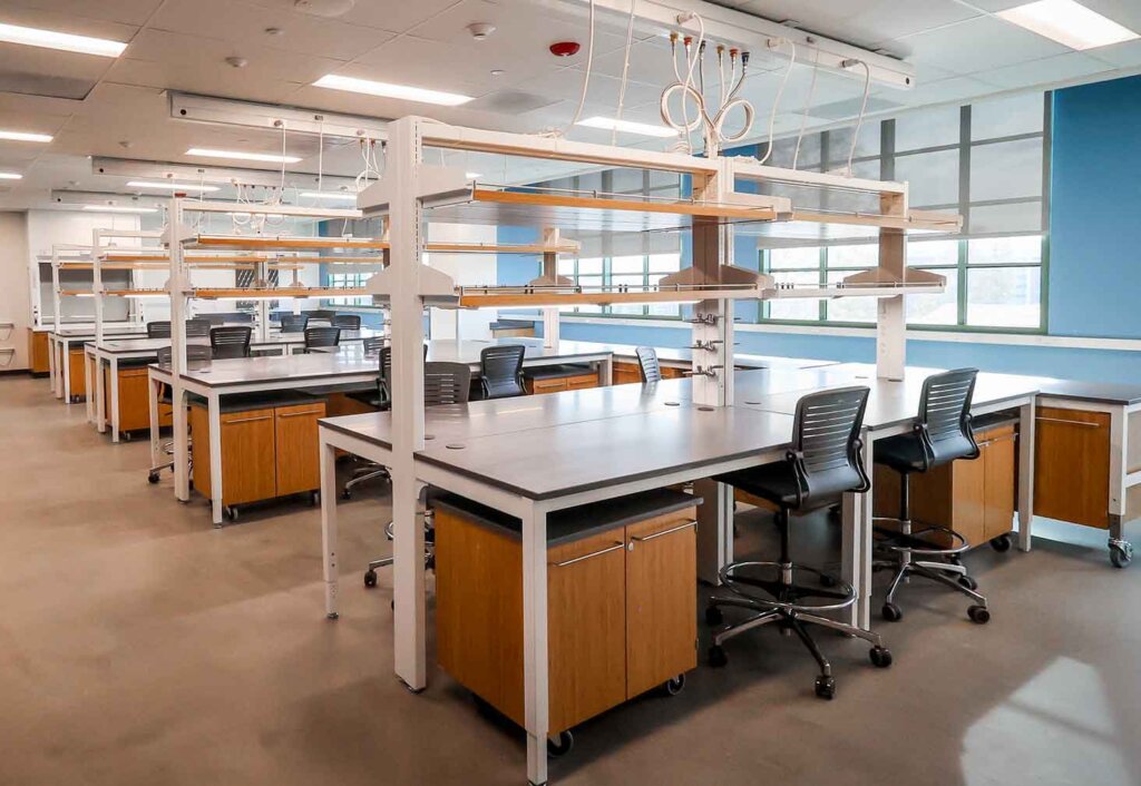 view of an empty lab room with several work stations