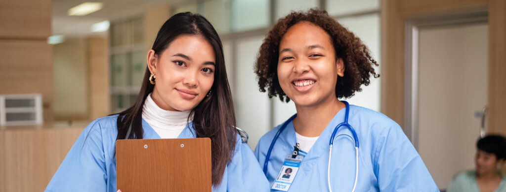 Two nurses posing for a photo