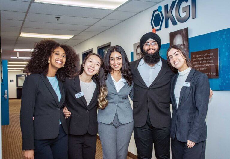 a student team poses with their mentor at KGI