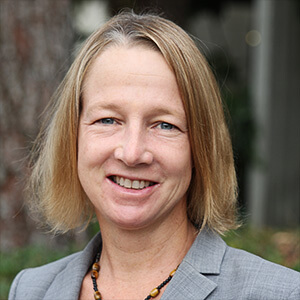 Professor Stacey Wood, professor of Psychology smiles for a picture.